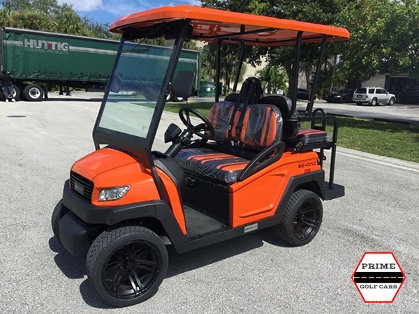 Orange Bintelli Beyond 4 Passenger Golf Cart affordable golf cart rental, golf cart rent doral