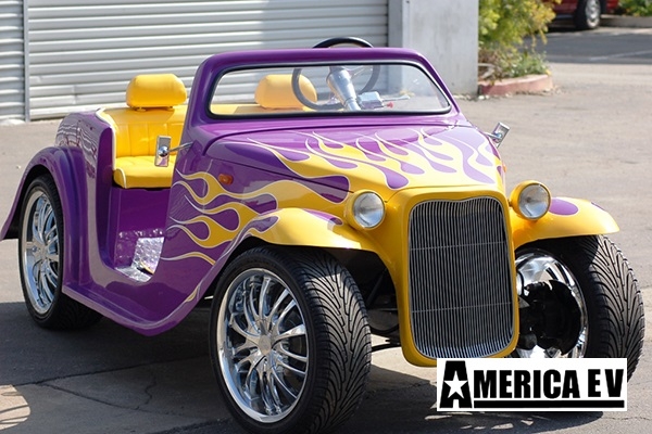 Purple California Roadster with Yellow Flames affordable golf cart rental, golf cart rent doral