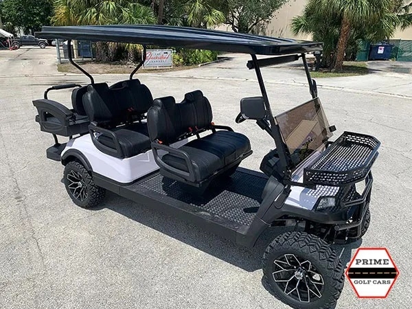 White Aluma 6 Passenger Lifted Golf Cart affordable golf cart rental, golf cart rent doral
