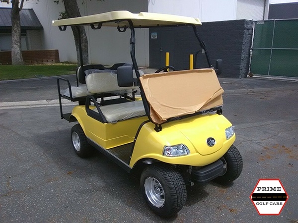 Yellow Evolution 4 Passenger Golf Cart affordable golf cart rental, golf cart rent doral